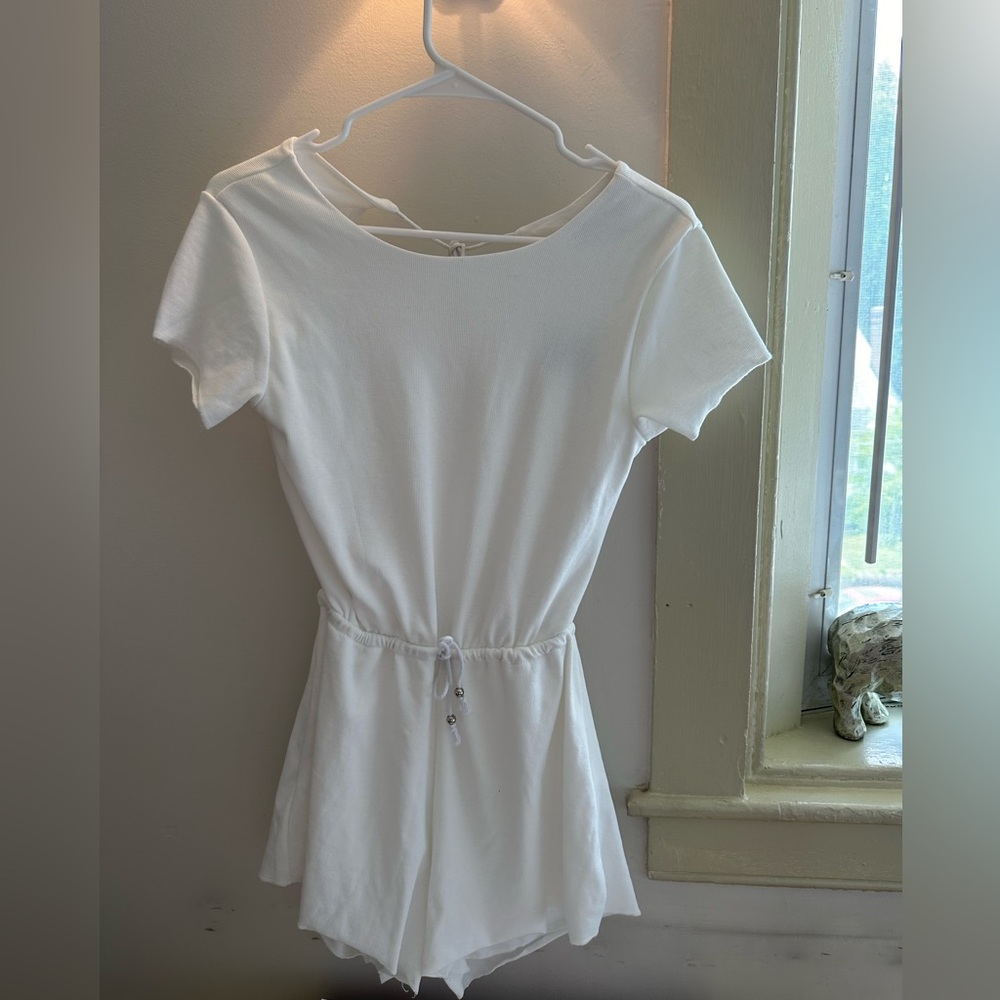 Adika white jumpsuit !! Open back, never worn